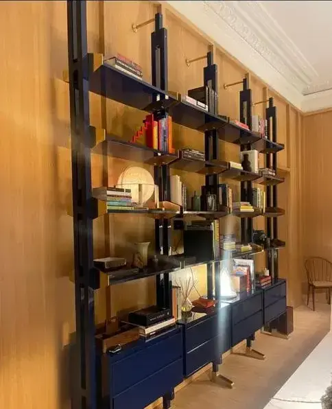 Navy bookshelf brass hardware light wood